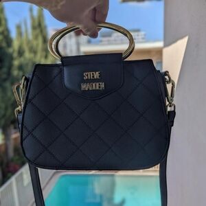 Crossbody Bira Steve Madden purse with cute gold accents and quilted leather loo